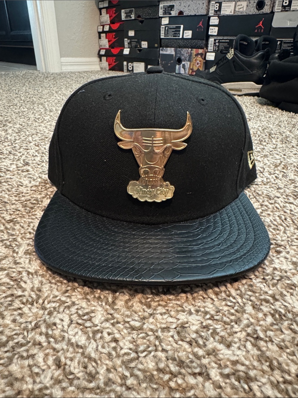 New Era Black Snapback with Gold Bull Metal Badge
